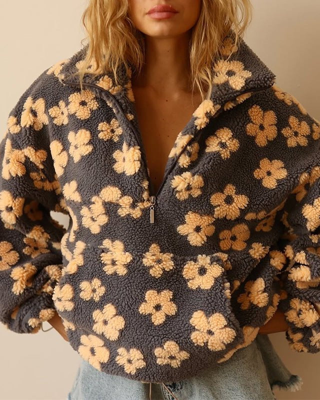 Floral Teddy Fleece Half Zip Jacket featuring a retro daisy print in an oversized sherpa style, perfect for cozy casual wear. 0