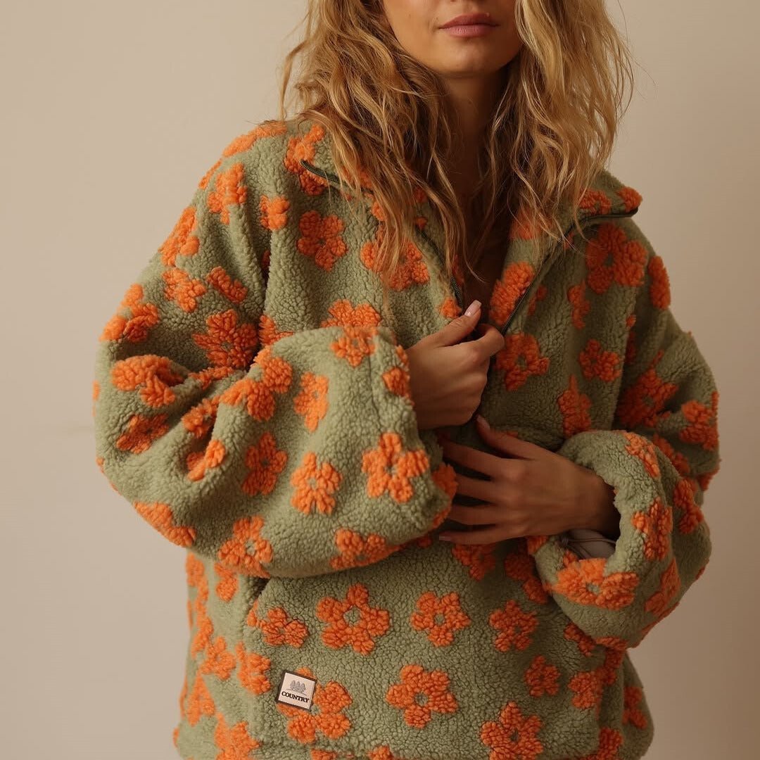 Floral Teddy Fleece Half Zip Jacket featuring a retro daisy print in an oversized sherpa style, perfect for cozy casual wear. 5