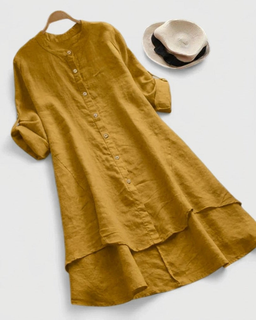 Linen shirt dress with asymmetric layered hem, featuring a versatile button-down design, perfect for summer wear in plus sizes. 0