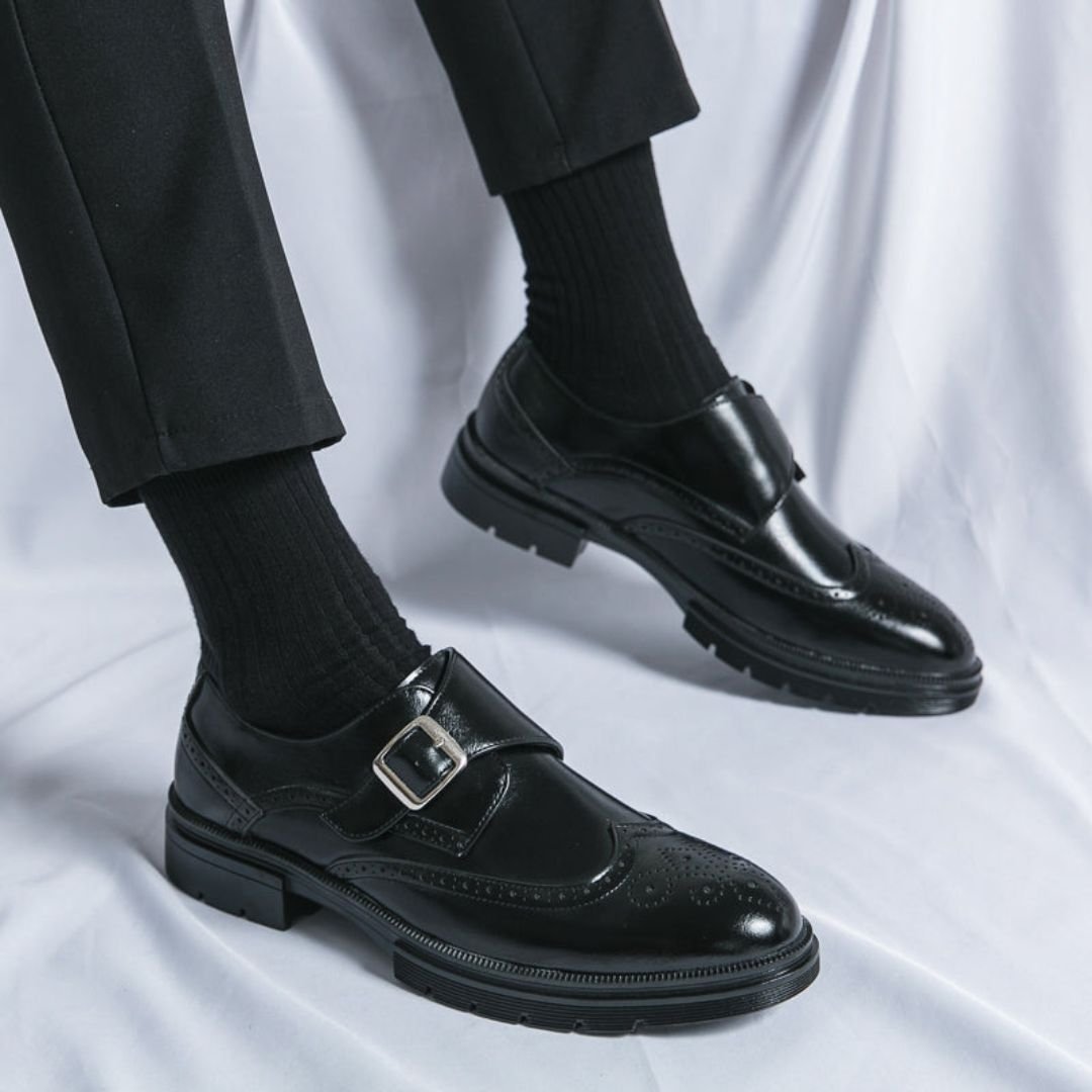 Men's black leather dress shoes featuring elegant wingtip brogue detailing and a stylish monk strap closure, perfect for formal occasions and versatile enough for any wardrobe 3