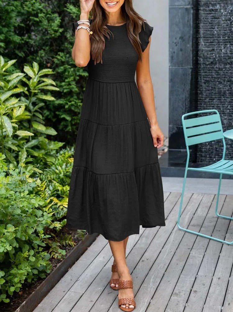 Elegant tiered maxi dress featuring tummy control and cap sleeves, designed for a flattering A-line silhouette, perfect for any occasion. 11
