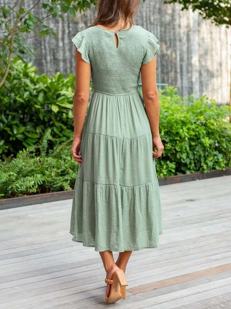 Elegant tiered maxi dress featuring tummy control and cap sleeves, designed for a flattering A-line silhouette, perfect for any occasion. 4