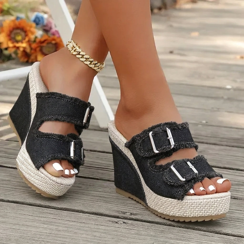 Wedge sandals for women featuring adjustable straps and cushioned comfort, designed with a modern fray edge for stylish summer wear. 1