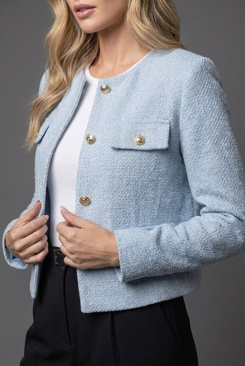 Women's cropped blazer featuring elegant tweed design and gold buttons, round neck, and tailored fit for a sophisticated look. 2