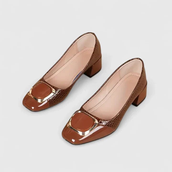 Women's croc-embossed patent leather loafers with block heel and stylish chain detail in a glossy finish. 6