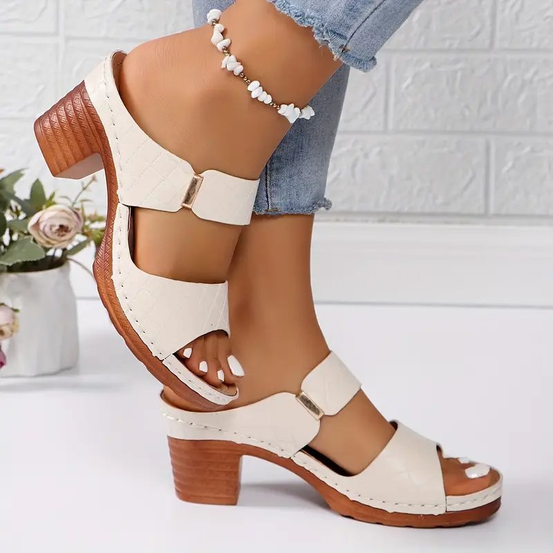 Women's brown sandals featuring a cushioned footbed and stylish block heel, crafted from woven synthetic leather for comfort and durability. 6