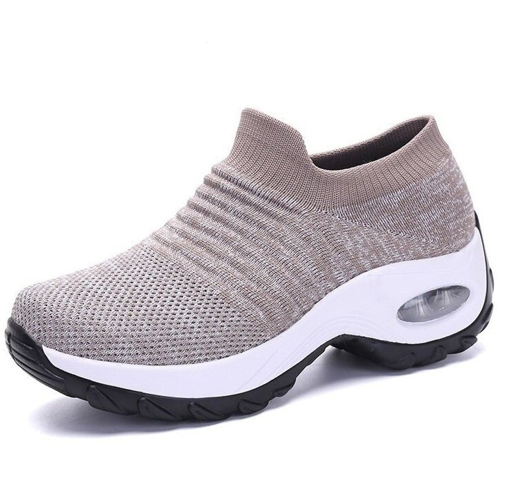 Women's slip-on sneakers featuring air cushion technology and a breathable knit design, perfect for all-day comfort and stylish casual wear. 5