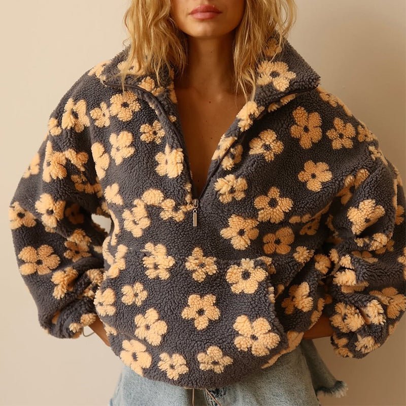 Floral Teddy Fleece Half Zip Jacket featuring a retro daisy print in an oversized sherpa style, perfect for cozy casual wear. 0