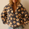 Floral Teddy Fleece Half Zip Jacket featuring a retro daisy print in an oversized sherpa style, perfect for cozy casual wear. 0