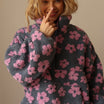 Floral Teddy Fleece Half Zip Jacket featuring a retro daisy print in an oversized sherpa style, perfect for cozy casual wear. 3