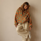 Floral Teddy Fleece Half Zip Jacket featuring a retro daisy print in an oversized sherpa style, perfect for cozy casual wear. 7