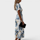 Floral Wrap Midi Dress with Ruched Waist and Gold Accents – Elegant Summer Wedding Guest Dress 1