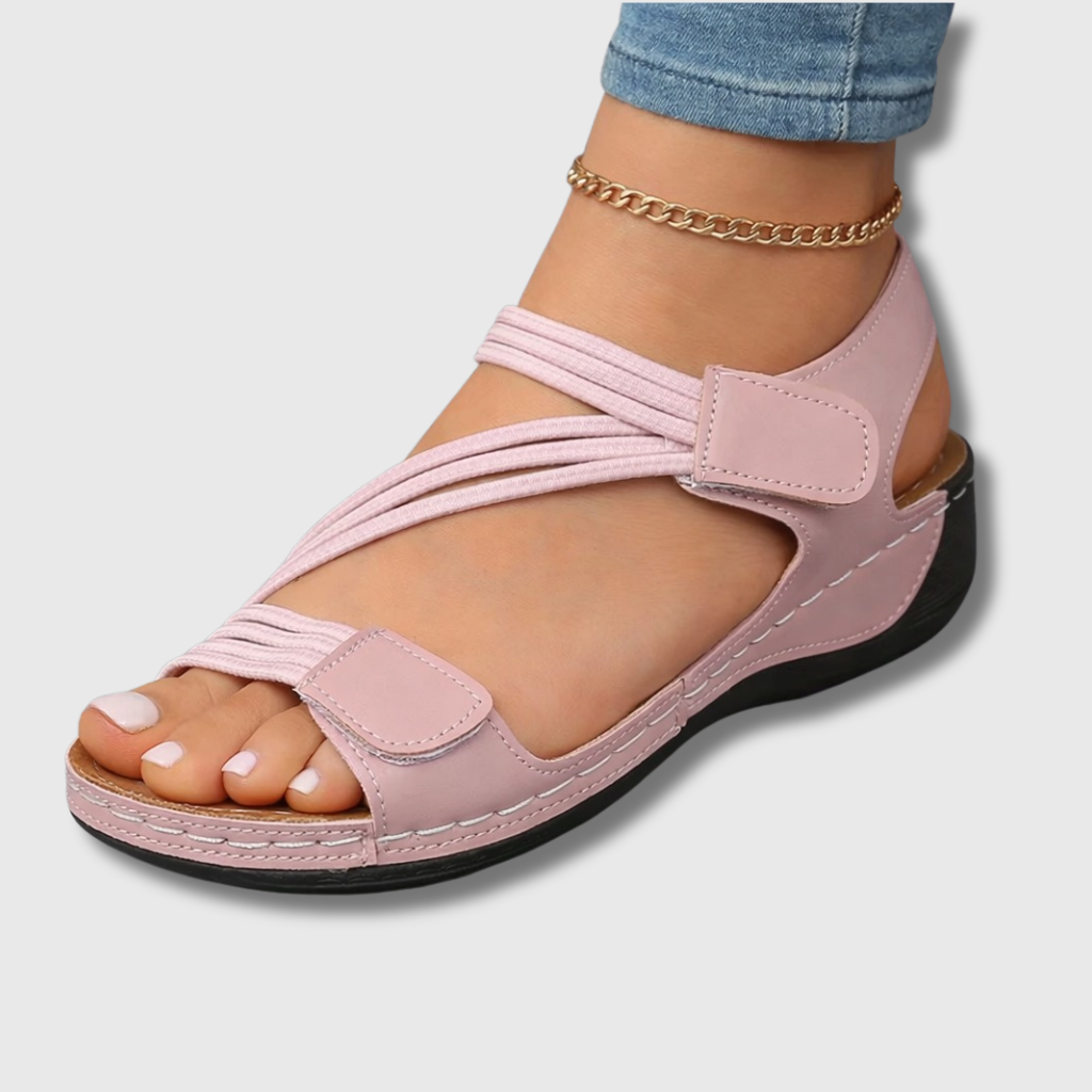 Lightweight orthopedic sandals for women featuring a cushioned footbed and adjustable straps, designed with a modern strappy look for comfort and style. 0