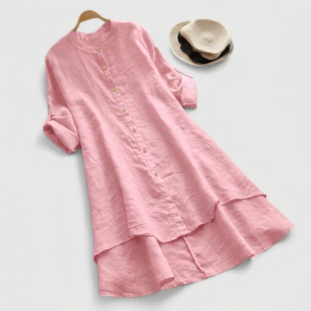 Linen shirt dress with asymmetric layered hem, featuring a versatile button-down design, perfect for summer wear in plus sizes. 1