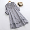Linen shirt dress with asymmetric layered hem, featuring a versatile button-down design, perfect for summer wear in plus sizes. 4