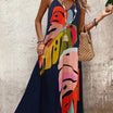 Maxi dress featuring a vibrant tropical leaf print, sleeveless V-neck design, and made from lightweight fabric, perfect for casual summer outings for women. 1