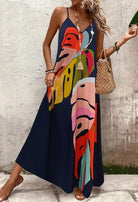 Maxi dress featuring a vibrant tropical leaf print, sleeveless V-neck design, and made from lightweight fabric, perfect for casual summer outings for women. 2