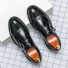 Men's black leather dress shoes featuring elegant wingtip brogue detailing and a stylish monk strap closure, perfect for formal occasions and versatile enough for any wardrobe 1