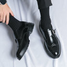 Men's black leather dress shoes featuring elegant wingtip brogue detailing and a stylish monk strap closure, perfect for formal occasions and versatile enough for any wardrobe 2