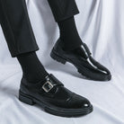Men's black leather dress shoes featuring elegant wingtip brogue detailing and a stylish monk strap closure, perfect for formal occasions and versatile enough for any wardrobe 3