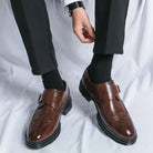 Men's black leather dress shoes featuring elegant wingtip brogue detailing and a stylish monk strap closure, perfect for formal occasions and versatile enough for any wardrobe 5