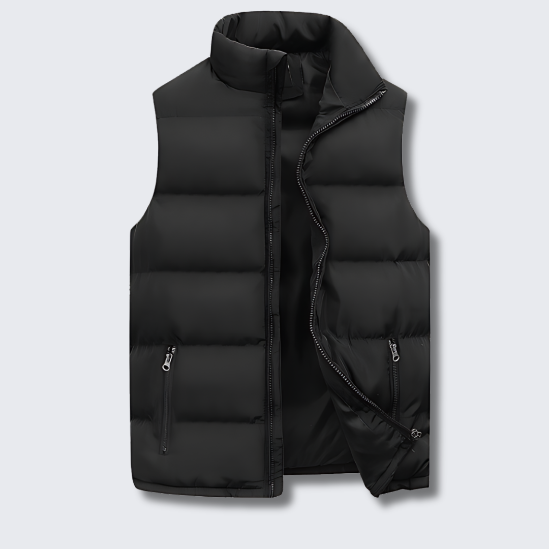 Men's puffer vest featuring quilted insulation, a modern design for layering, and durable zippers for enhanced functionality. 0