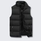Men's puffer vest featuring quilted insulation, a modern design for layering, and durable zippers for enhanced functionality. 0
