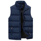 Men's puffer vest featuring quilted insulation, a modern design for layering, and durable zippers for enhanced functionality. 2