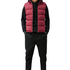 Men's puffer vest featuring quilted insulation, a modern design for layering, and durable zippers for enhanced functionality. 4