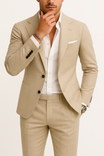 Men's slim fit suit in a modern two-piece design, featuring a comfortable fit ideal for winter events, showcasing a stylish blazer and tailored trousers. 2