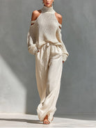Off-shoulder two piece set featuring wide-leg trousers, showcasing a modern feminine design perfect for women’s casual or dressy occasions. 0