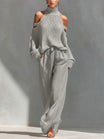 Off-shoulder two piece set featuring wide-leg trousers, showcasing a modern feminine design perfect for women’s casual or dressy occasions. 1