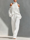 Off-shoulder two piece set featuring wide-leg trousers, showcasing a modern feminine design perfect for women’s casual or dressy occasions. 2