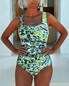 Multi-color printed one piece swimsuit for women featuring tummy control and adjustable straps, perfect for a flattering fit at the beach or pool. 8
