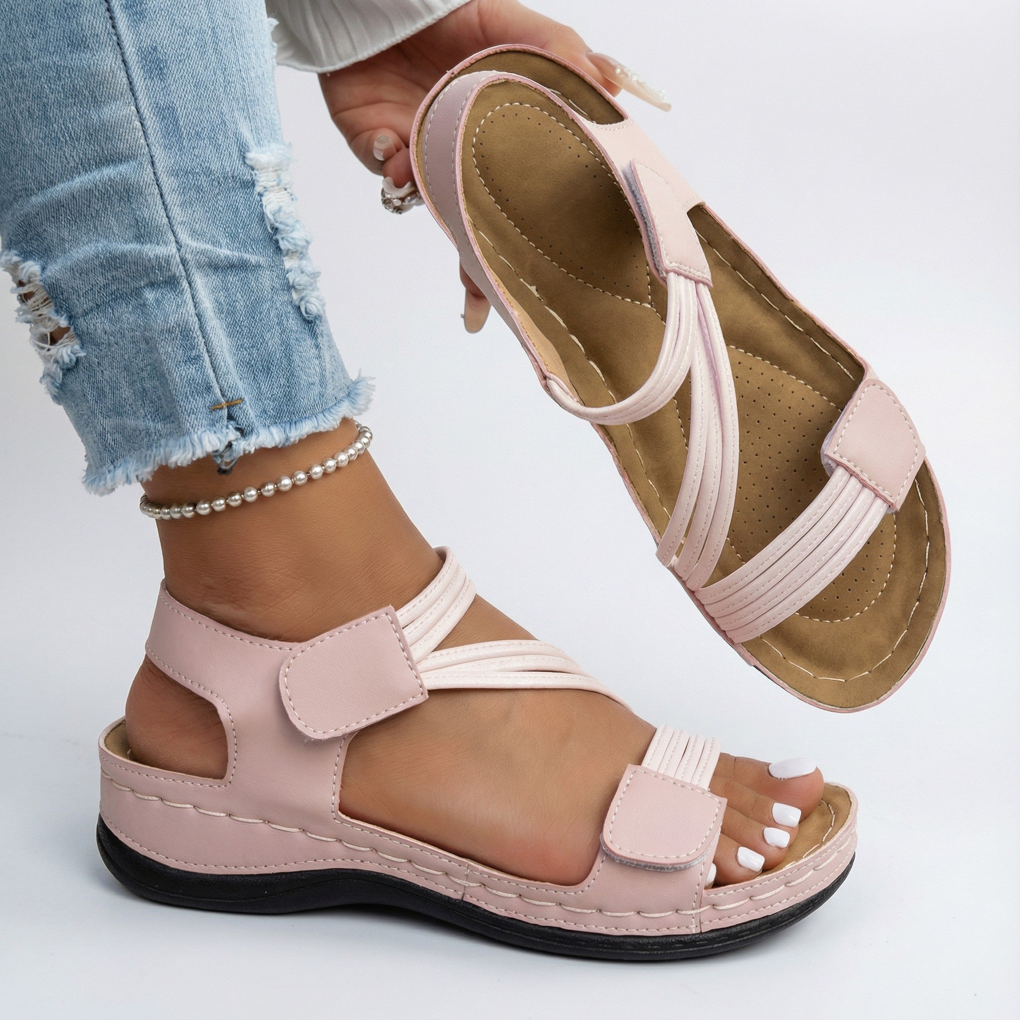 Orthopedic comfort sandals featuring adjustable straps, a lightweight design, and perfect for casual summer footwear. 1