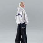 Oversized hoodie featuring a stylish graphic design, made from heavyweight cotton-blend fleece, showcasing modern streetwear style with a convenient kangaroo pocket. 5