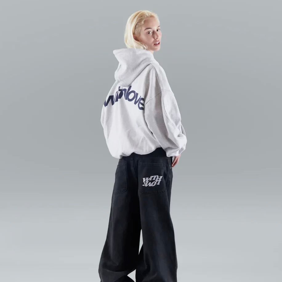 Oversized hoodie featuring a stylish graphic design, made from heavyweight cotton-blend fleece, showcasing modern streetwear style with a convenient kangaroo pocket. 5