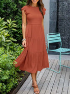 Elegant tiered maxi dress featuring tummy control and cap sleeves, designed for a flattering A-line silhouette, perfect for any occasion. 0