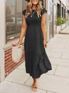 Elegant tiered maxi dress featuring tummy control and cap sleeves, designed for a flattering A-line silhouette, perfect for any occasion. 1