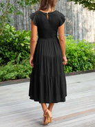 Elegant tiered maxi dress featuring tummy control and cap sleeves, designed for a flattering A-line silhouette, perfect for any occasion. 2