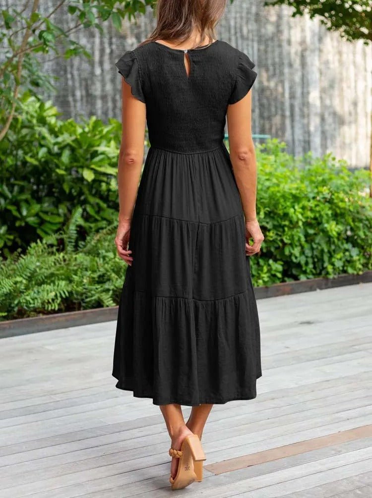 Elegant tiered maxi dress featuring tummy control and cap sleeves, designed for a flattering A-line silhouette, perfect for any occasion. 2