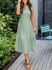 Elegant tiered maxi dress featuring tummy control and cap sleeves, designed for a flattering A-line silhouette, perfect for any occasion. 3