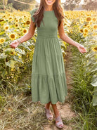 Elegant tiered maxi dress featuring tummy control and cap sleeves, designed for a flattering A-line silhouette, perfect for any occasion. 5