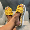 Wedge sandals for women featuring a stylish bow detail, cushioned comfort, and an elegant woven design, perfect for summer outings. 3