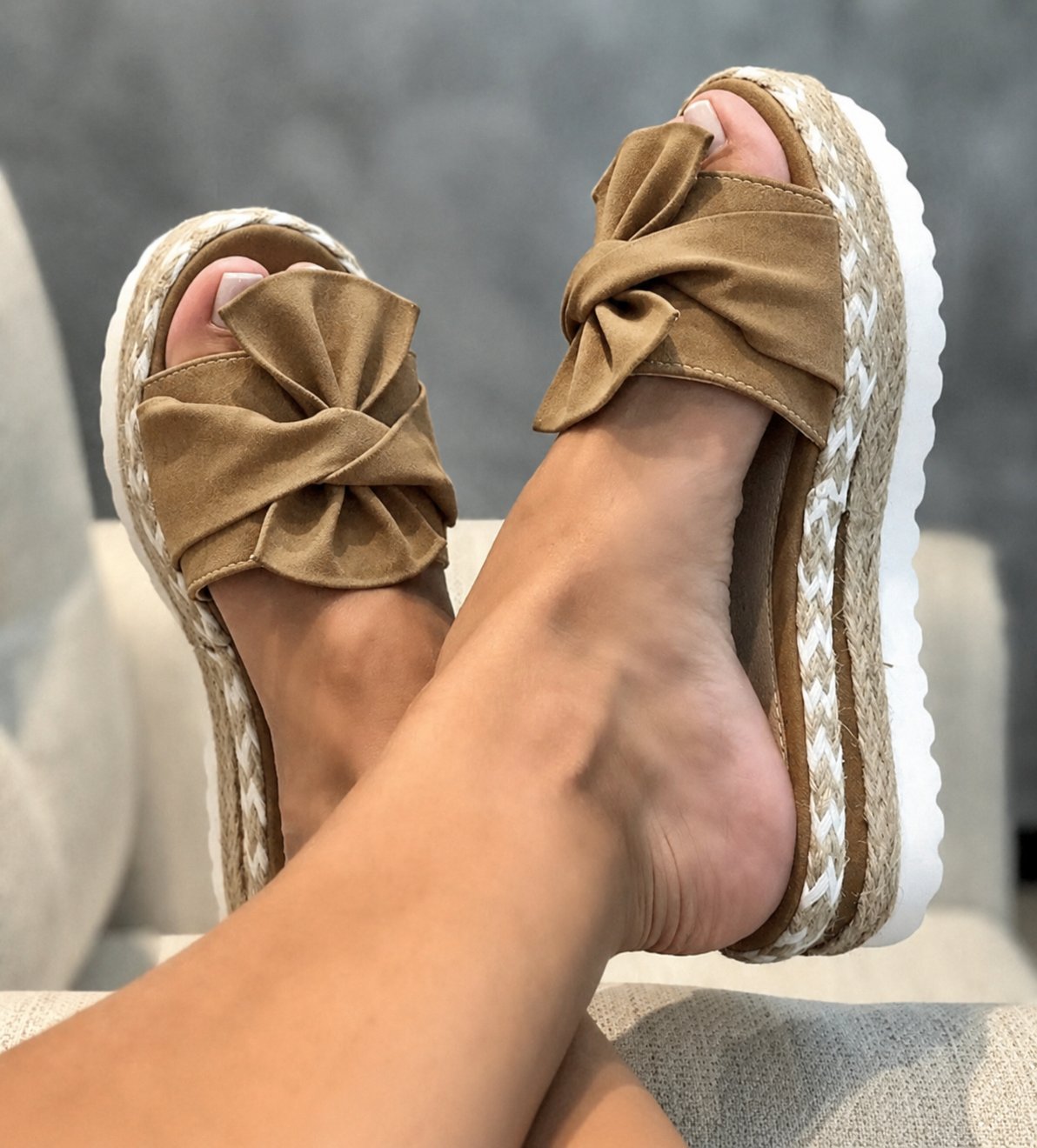 Wedge sandals for women featuring a stylish bow detail, cushioned comfort, and an elegant woven design, perfect for summer outings. 4
