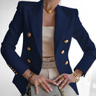 Women's double-breasted black blazer with structured fit, featuring stylish gold buttons, designed for a flattering silhouette, available in plus sizes. 4