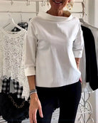 Women's cowl neck top with 3/4 sleeves in a versatile solid design, featuring a relaxed fit for effortless style and comfort. 4