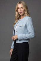 Women's cropped blazer featuring elegant tweed design and gold buttons, round neck, and tailored fit for a sophisticated look. 1