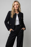 Women's cropped blazer featuring elegant tweed design and gold buttons, round neck, and tailored fit for a sophisticated look. 3