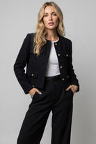 Women's cropped blazer featuring elegant tweed design and gold buttons, round neck, and tailored fit for a sophisticated look. 3